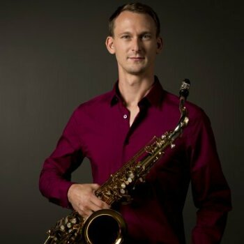 Michael Sawzin holding instrument