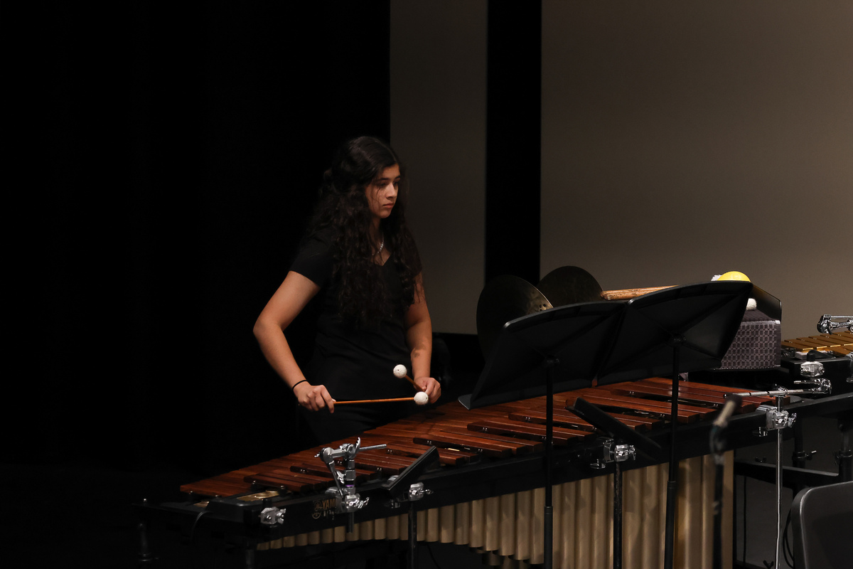 student playing xylophone